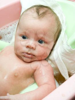 Royalty Free Photo of a Baby Boy in the Bath