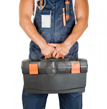 Royalty Free Photo of a Repairman Holding a Toolkit 
