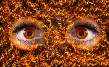 Royalty Free Photo of a Close-up of a Red Eyes on Fire
