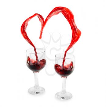 Royalty Free Photo of a Heart From Pouring Red Wine