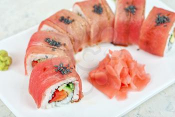 Fuji Sushi rolls made of tuna, pepper, avocado, cucumber