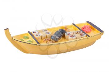 japanese cuisine of wooden ship with various type of sushi on a white