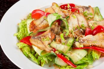 Salad of smoked eel, lettuce,Chinese cabbage and vegetables