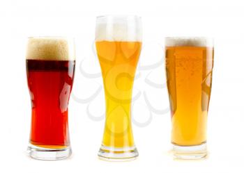 Set of different kind of beer at glasses isolated on a white background