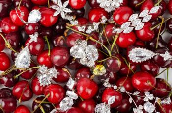 Jewels at fruit red ripe cherries berry background