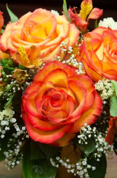 closeup of vibrant orange roses flower bouquet