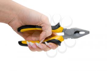 Female hand hold black and yellow pliers isolated over white background 