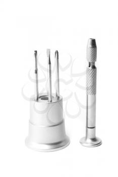 Set of metallic screwdrivers isolated on a white background