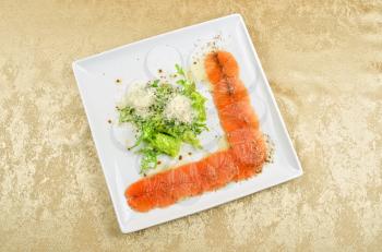 Fish Carpaccio with salad and mozzarella