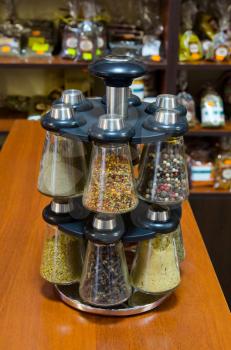 Different spices on the counter of market