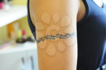 closeup of tatoo at woman hand