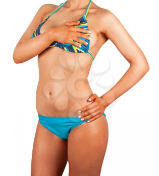 Closeup of a female body in a swimsuit, isolated on white