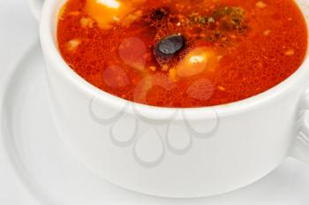 Closeup of solyanka soup at plate