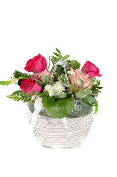Bunch of roses in a vase isolated on white background