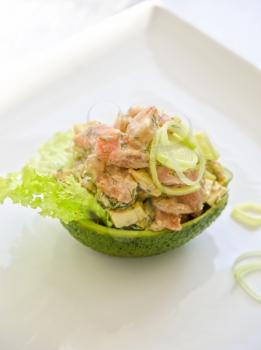 Fresh salad with shrimps, salmon and avocado