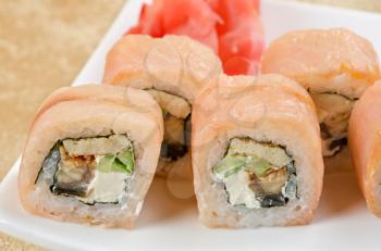 sushi roll of shrimp, eel, cucumber, pepper and sauce