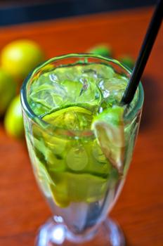 cold fresh lemonade drink with cucumber and lime