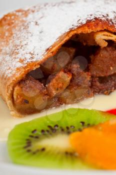 Apple strudel with fruits and sauce