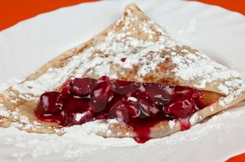 pancakes with sweet cherry sauce