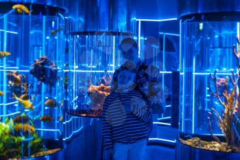 Photo of woman with son in the oceanarium