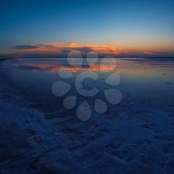 Beauty sunset on salty lake in Altay, Siberia, Russia