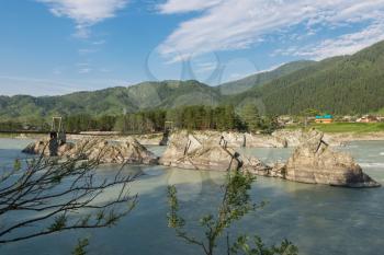 Fast mountain river Katun in Altay, Siberia, Russia. A popular tourist place called the Dragon's Teeth