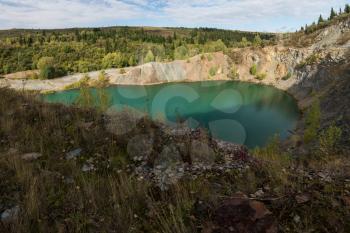 Blue lake in Altai. This is a former copper mine that was flooded with water