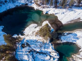 Aerial view of winter blue lakes in Altai mountains