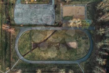Old Football field in a beauty day. Aerial view.