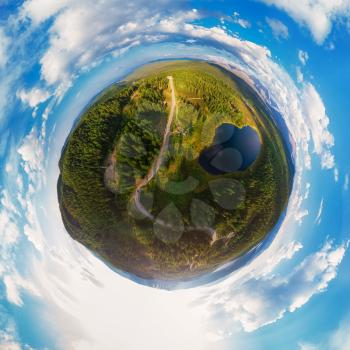 Little planet transformation of spherical panorama 360 degrees of the lake of Kidelyu near the Ulagan mountain pass, Altai Republic, Russia. Aerial drone view, virtual reality content.