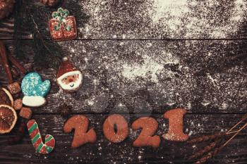 Different ginger cookies for new 2019 year holiday on wooden background, xmas theme
