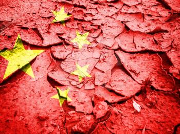 China flag on dry cracked earth texture