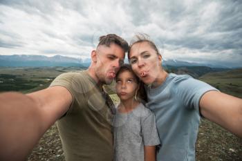 Selfie of family in mountain, beauty summer landcape