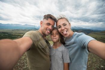 Selfie of family in mountain, beauty summer landcape