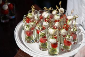 Food catering concept: Various snacks on table, outdoor banquet
