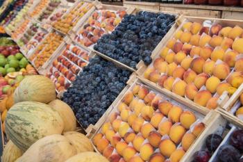 Assortment of fresh organic healthy fruits at the market