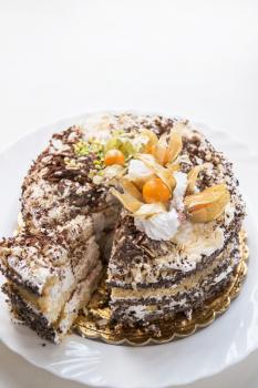 Chocolate cake with walnuts and physalis