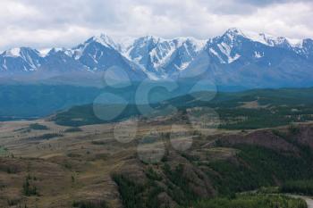Kurai steppe and North-Chui ridge of Altai mountains, Russia. Cloud day.