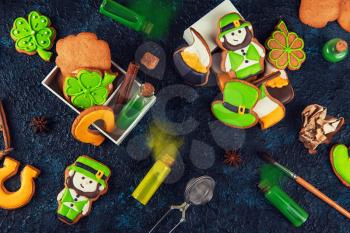Gingerbreads cookies for Patrick's day on concrete background
