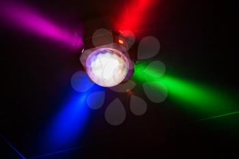 Colorful disco ball in night club, party concept