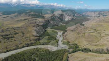 Aerial video of the Kurai steppe and Chuya river between the Kurai and the North Chuia Ranges in the south-eastern Altai, Siberia, Russia
