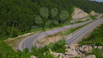 Winding road in the mountains, Altai Krai, Western Siberia, Russia. Road to Resort town Belokurikha 2