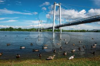 Pedestrian bridge in the water of Yenisei river on Krasnoyarsk, Russia