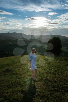 Woman in blue dress in Altai mountain, beauty summer landcape, travel, lesure concept/