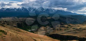 Kurai steppe and North-Chui ridge on background. Altai mountains, Russia.