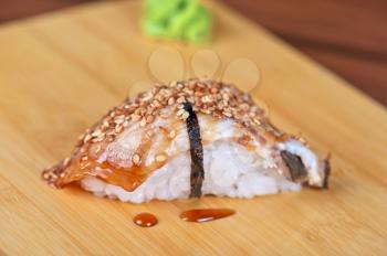 sushi unagi with sauced slice of smoked eel