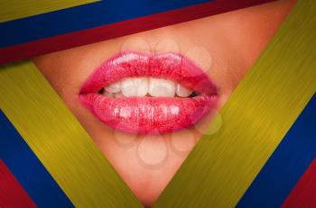 Beautiful female lips closeup behind colombia background