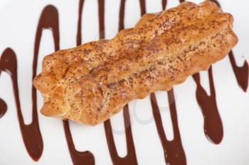 traditional eclair on a choco background.