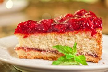 tasty cake with berry's and fresh mint