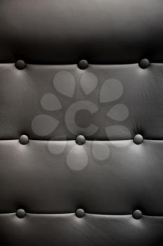 Background of black a leather armchair